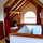 Looking over staircase at upstairs sleeping nook