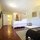 Living Room/Bedroom and Hunter Douglas' Duette® honeycomb shades open from top or bottom
