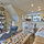 Opposite sofa in living romm and stairs opening.