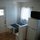 Travertine floors and a built-in breakfast nook