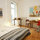 double bedroom with door to small private terrace