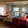 Bedroom.  Slanted ceilings, lots of lamps.