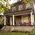 The Tree Nook apartment is on the top floor. The entryway and porch are shared with two other apartments.