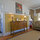 living room showing kitchen & bedroom