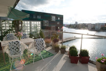 Central apt with waterfront terrace