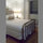 Bedroom has adjustable reading lights, a new air conditioner, and a clock radio.