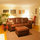 Part of living room, at night.