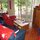 Lounge area— leather couch and recliner, tv/dvd/vcr/, board games, puzzles & basket of movies