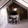 Dining Table/ Flat Screen TV and slide out Queen Bed on right side.