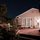                                                                                 Night view of main house