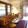 A charming, shared living room with fireplace.