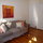 Couch, closet, and front door