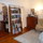 Sitting area - looking into kitchen, with bathroom to the right of the dresser.