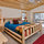 Master bedroom with king bed and access to back deck