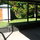 The screened-in patio lets you enjoy the outdoors while avoiding mosquitos. 