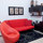 The sofa bed in the living room and TV corner