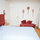 Master bedroom, part of mothers collection of carpet beaters!