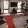 Corner gas fire place, game/theater chairs, twinkling lights in pine...