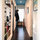 The hall to the bathroom and bedrooms. We love to decorate our home with art by our friends!