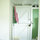 View from kitchen to utility room and back door. Photo by Lisa Warninger, Photographer 