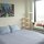 Your comfortable queen-size bed and fluffy pillows - complete with amazing views of Brooklyn!