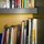 Bookshelf in the bigger room with some travel books also in English, various book and information about Padova and Veneto region