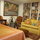 Antique filled living and dining room.