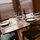 Apartment is equipped with dishes and flatware for a comfortable dining experience. Dining table located in bay window, seats 4 -6 people. 