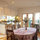 Sky lit dining and open kitchen look onto garden