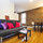 The livingroom with cool exposed brick wall (couch is slightly different now)