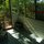 Another view of the sunporch, looking towards the front screen door.