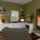Living Area - Fireplace, TV, Book Exchange