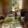 view of breakfast table with garden view