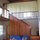 Downstairs sitting area looking up to master bedroom.