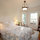 Your sunny bedroom includes all the comforts of home... Sofa, rocker, dresser, closet space...
