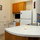 Kitchen is stocked with all the dishes, glassware, and cooking gear you may need.