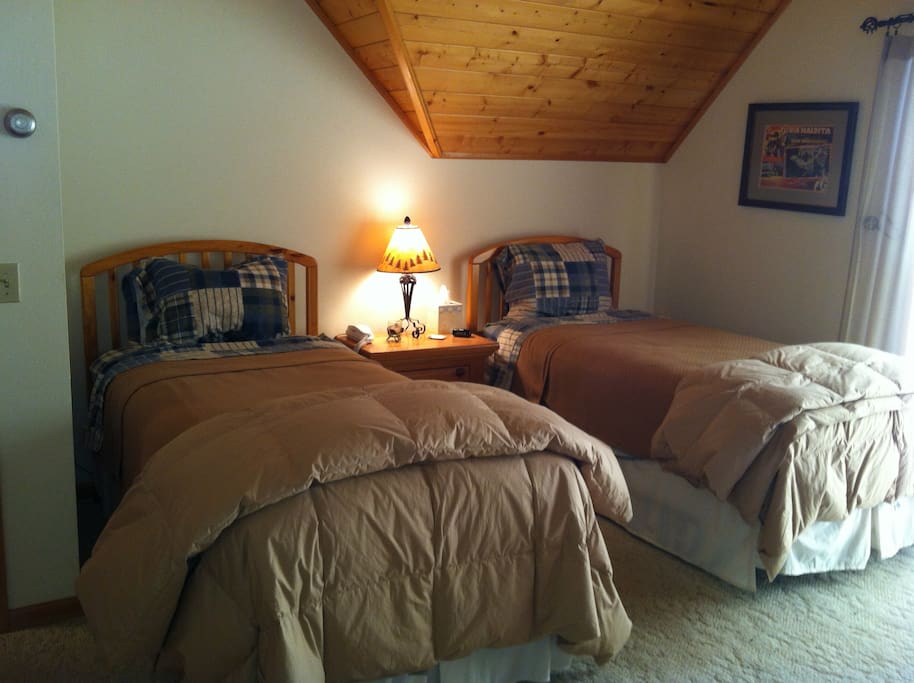 The Twin Spruce room with a view of the Sneffels Range from your own private deck.