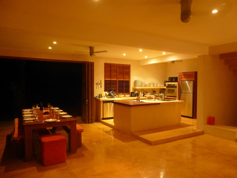 Open plan kitchen and dining area seating 12 persons