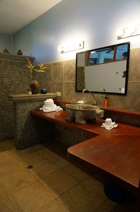 Full bath on the ground floor behind the kitchen