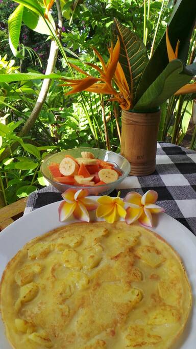 Breakfast by Komang: banana pancake, fresh fruit bowl