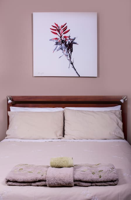 Comfortable double bed with crisp linen.