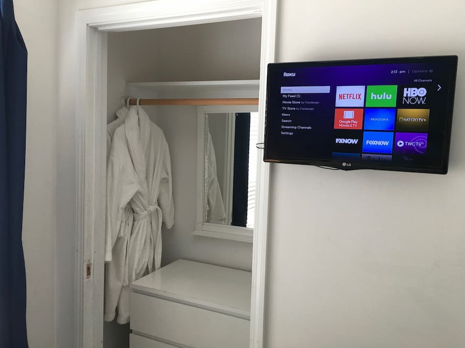 Closet w/dresser and 2 fresh white robes