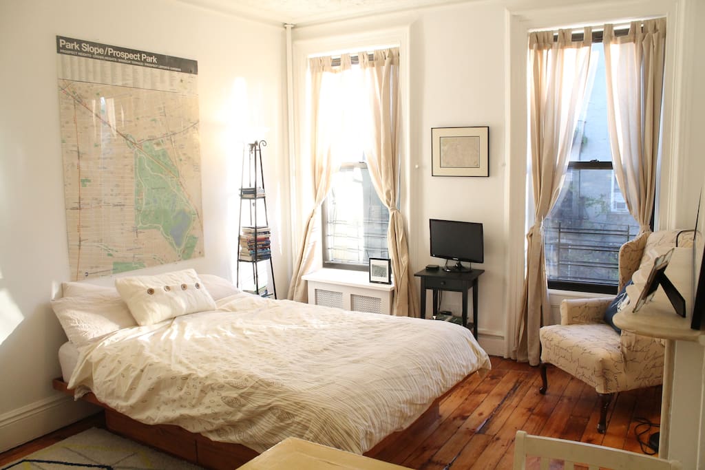Above the bed is a large neighborhood map to get you oriented. The TV gets local channels and Netflix!